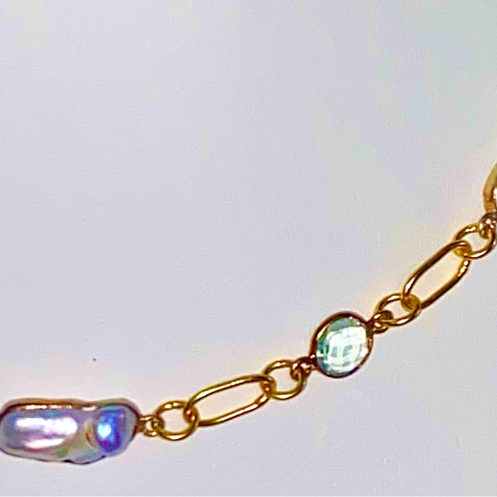 18 karat yellow gold, over Sterling Silver, containing 5 freshwater pearls, 17in